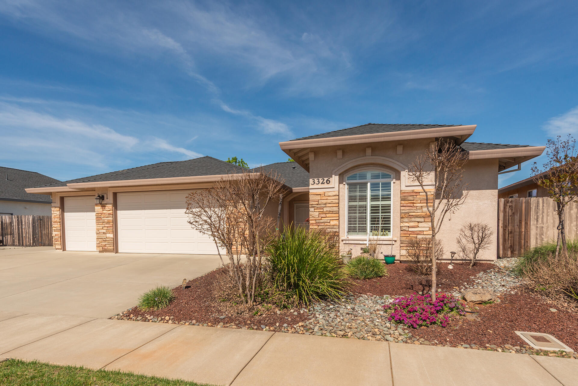 3326 Hotlam Road Redding, CA 96002 - Photo 2 of 60 a front view of a house with a yard