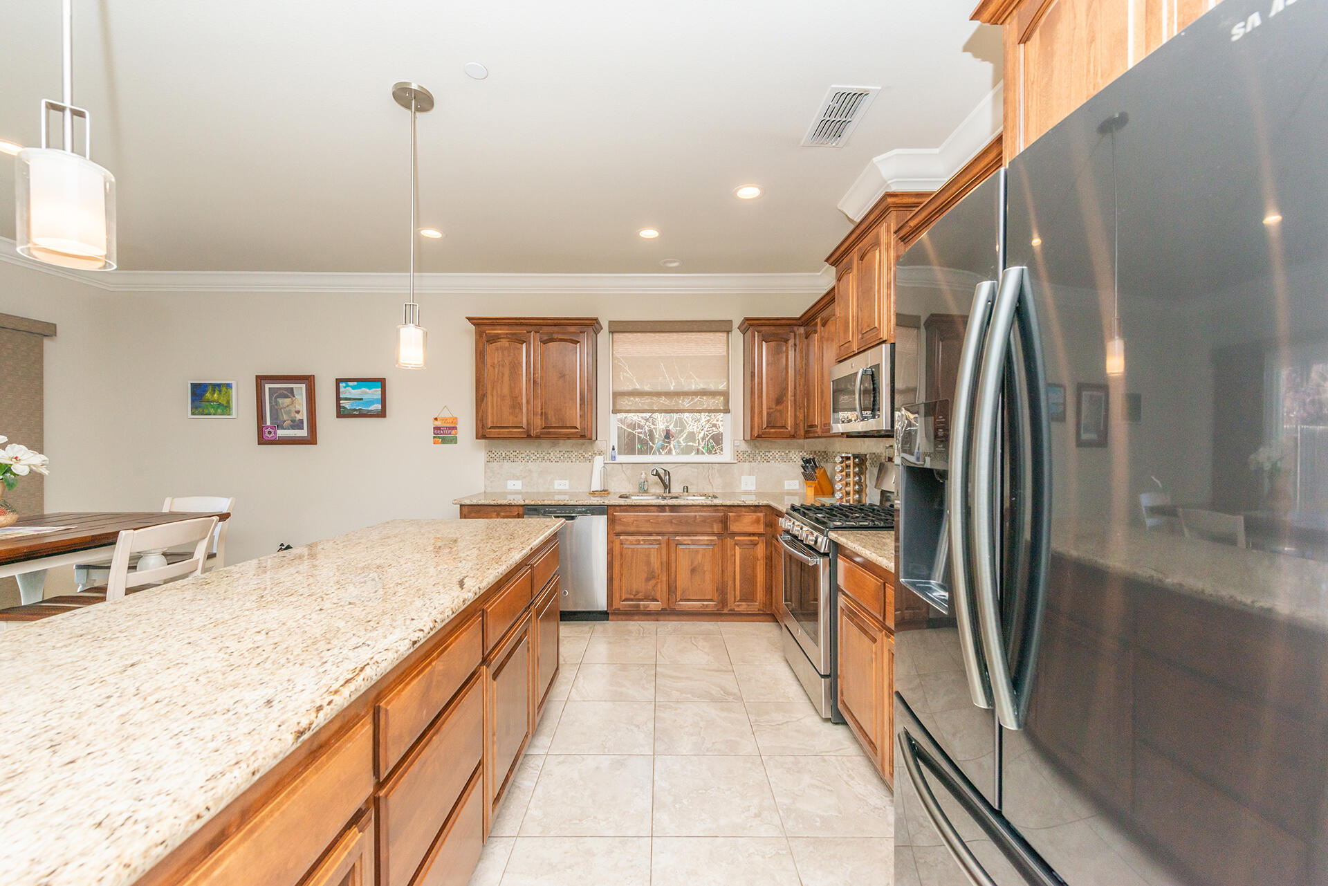 3326 Hotlam Road Redding, CA 96002 - Photo 29 of 60 a large kitchen with stainless steel appliances lots of counter top space