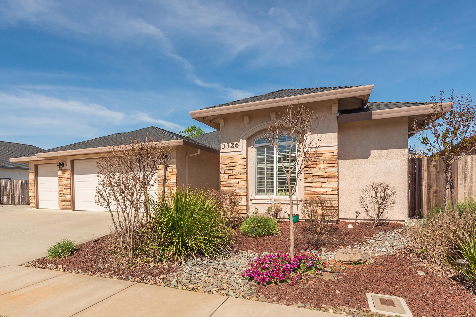 3326 Hotlam Road Redding, CA 96002 - Photo 3 of 60 a front view of a house with a yard