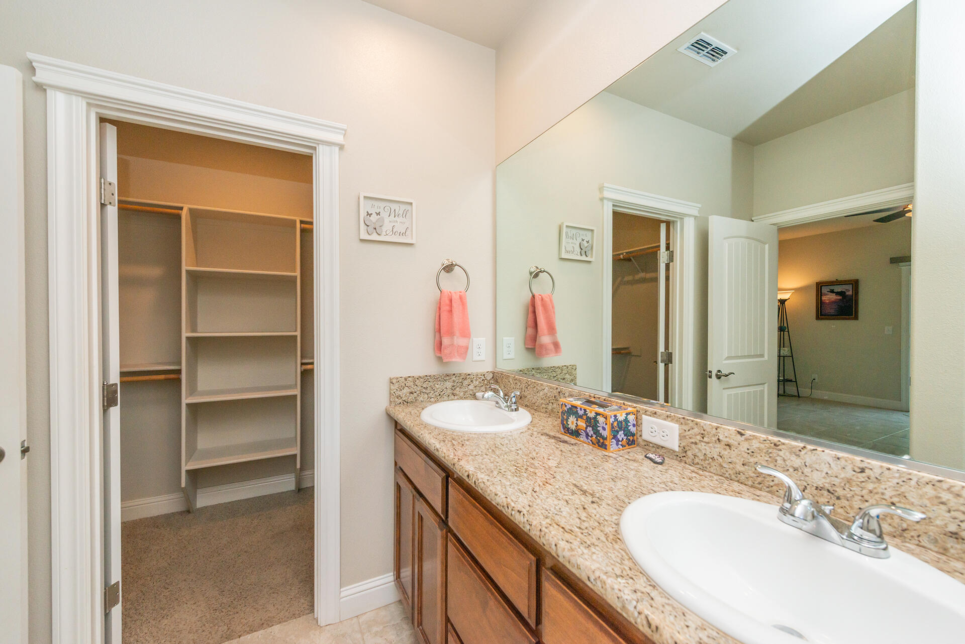 3326 Hotlam Road Redding, CA 96002 - Photo 35 of 60 a bathroom with a granite countertop sink and a mirror