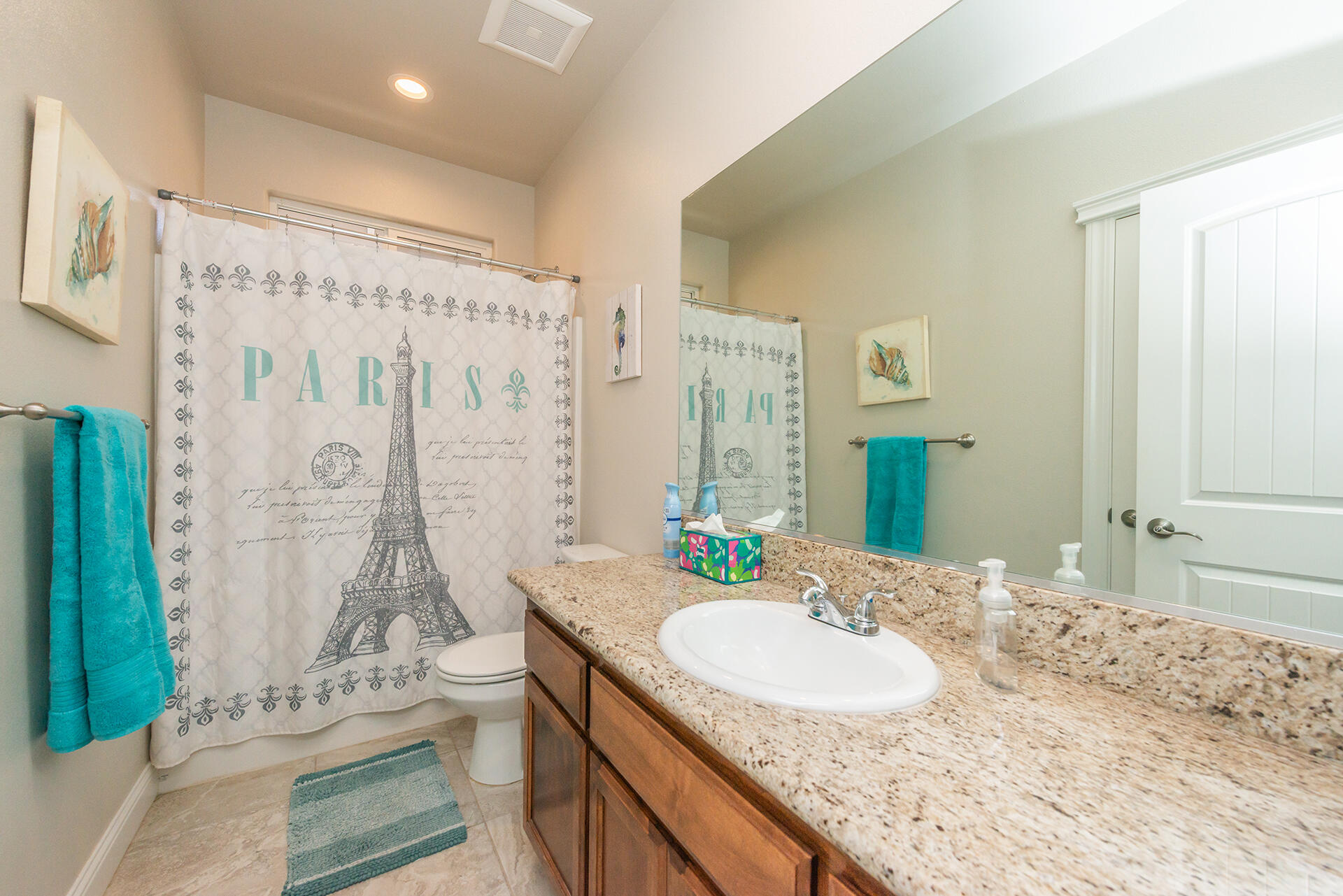 3326 Hotlam Road Redding, CA 96002 - Photo 40 of 60 a bathroom with a granite countertop sink and a mirror