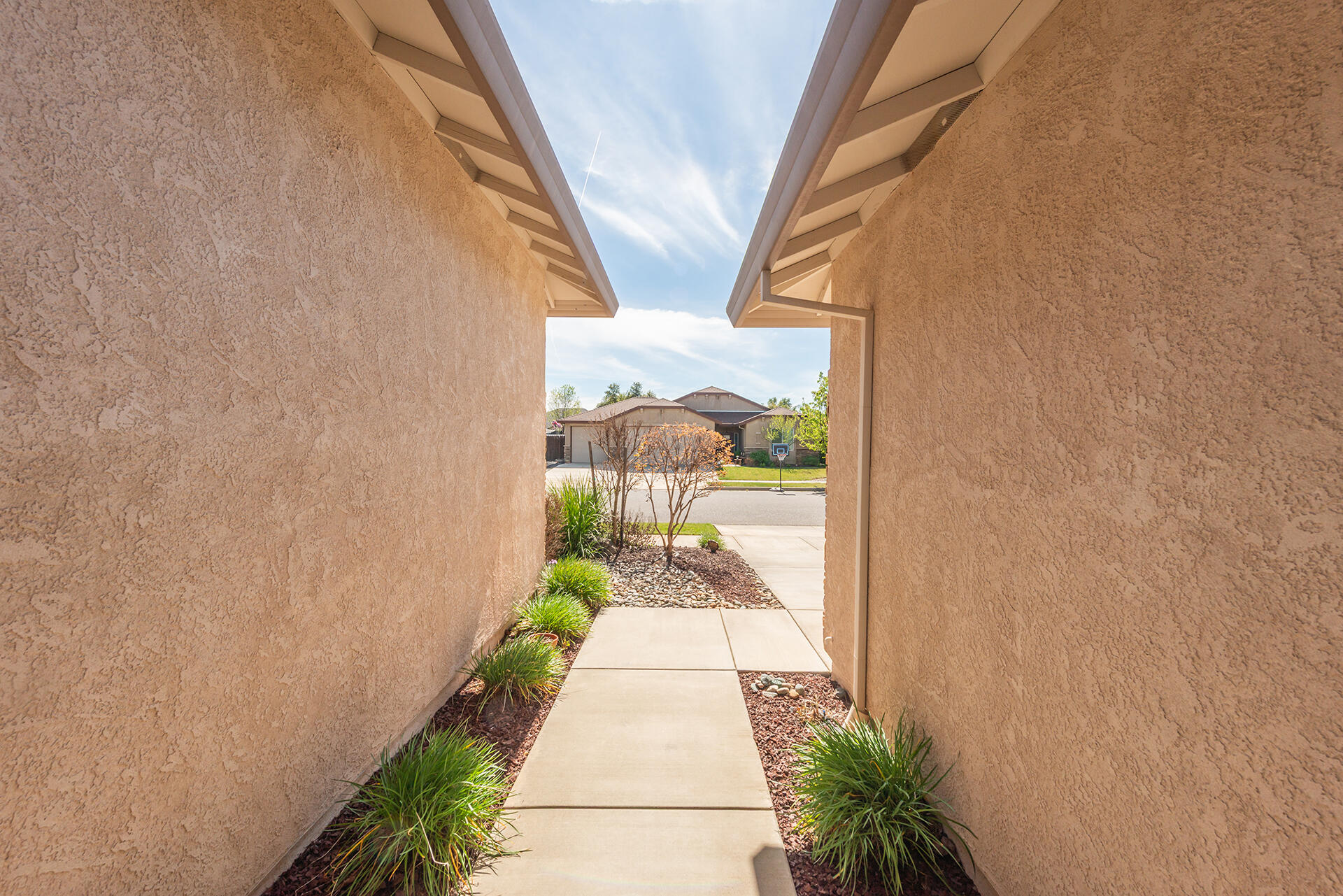 3326 Hotlam Road Redding, CA 96002 - Photo 4 of 60 a view of a pathway and a pathway in front of a door