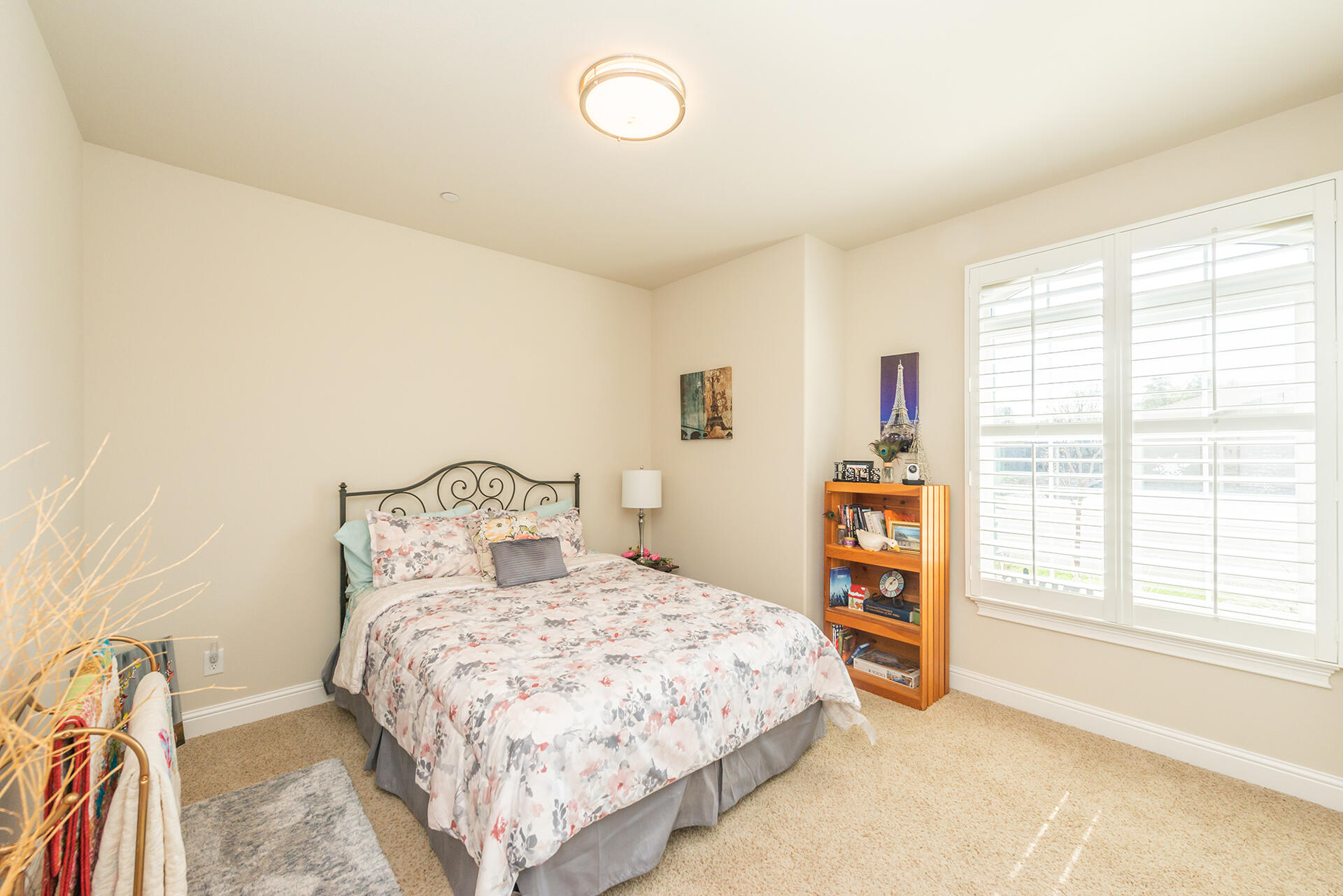 3326 Hotlam Road Redding, CA 96002 - Photo 42 of 60 a bedroom with a large bed and a large window