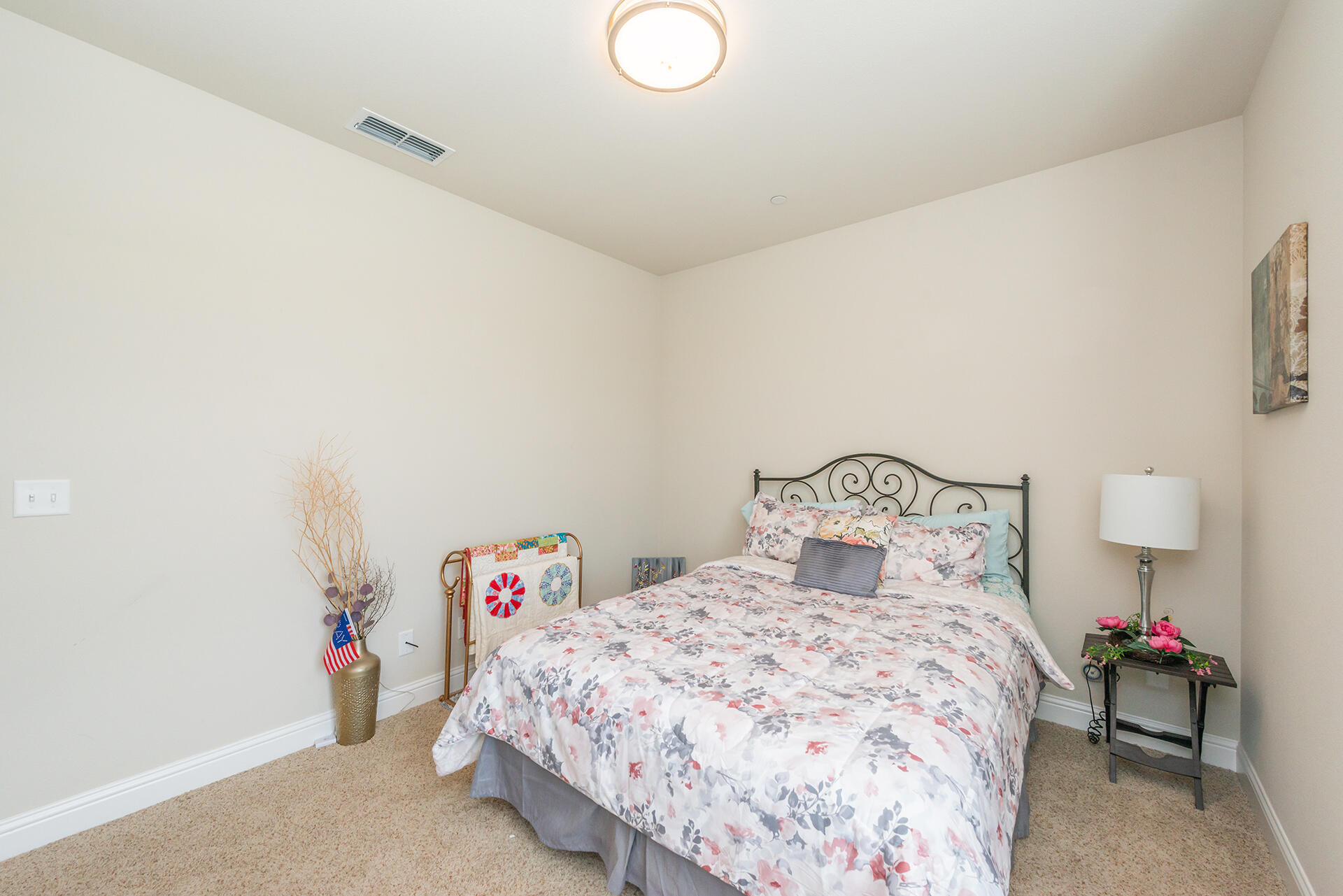3326 Hotlam Road Redding, CA 96002 - Photo 43 of 60 a bedroom with a bed and a lamp
