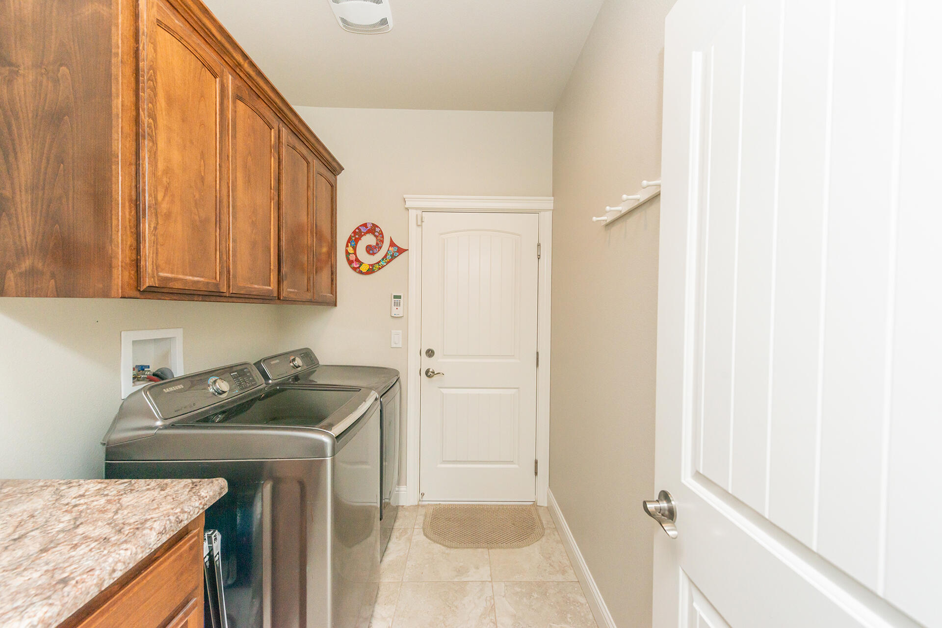 3326 Hotlam Road Redding, CA 96002 - Photo 47 of 60 a utility room with sink dryer and washer