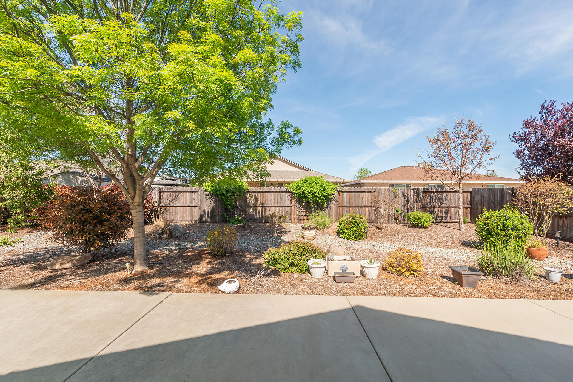 3326 Hotlam Road Redding, CA 96002 - Photo 49 of 60 front view of a house with a street
