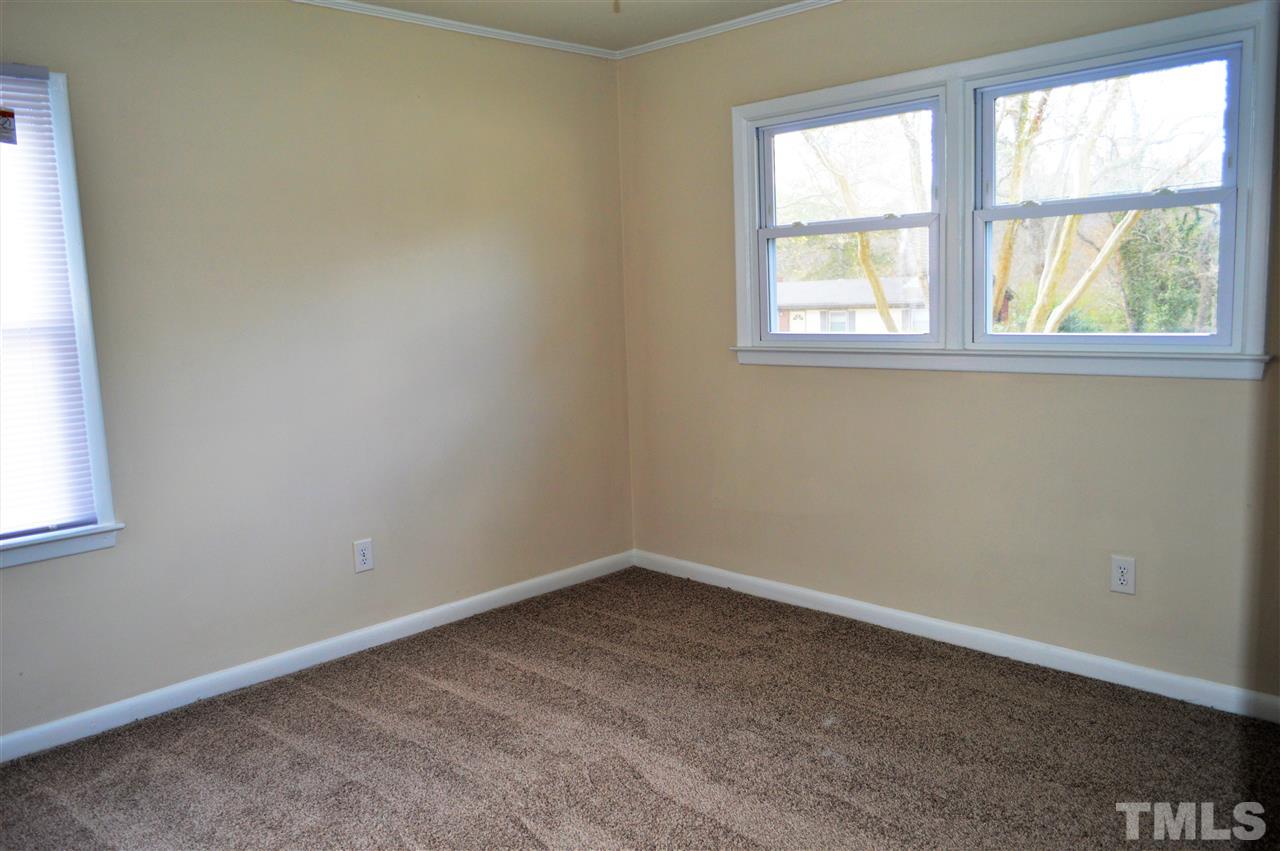 709 Friar Tuck Road Raleigh, NC 27610 - Photo 14 of 30 an empty room with a window