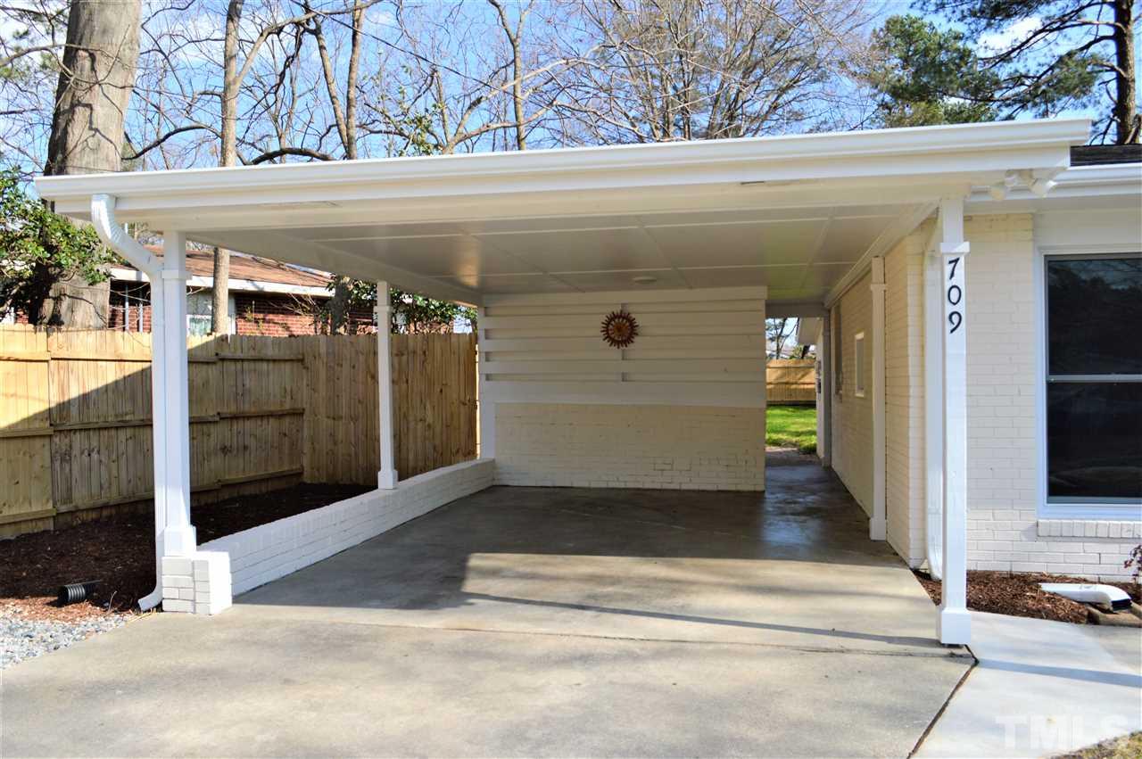 709 Friar Tuck Road Raleigh, NC 27610 - Photo 3 of 30 a view of a entryway door of a building