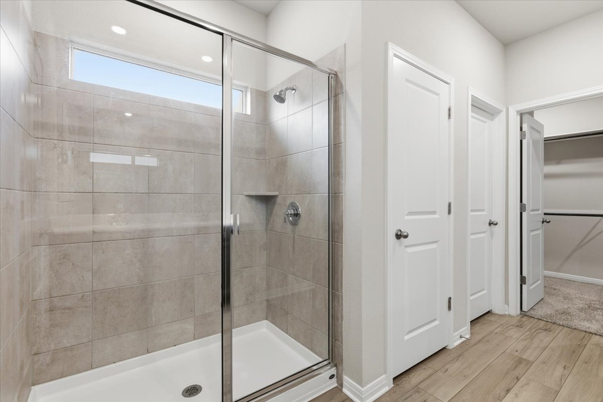 17705 Prairie Land Way Manor, TX 78653 - Photo 13 of 29 Primary Bathroom with walk-in shower