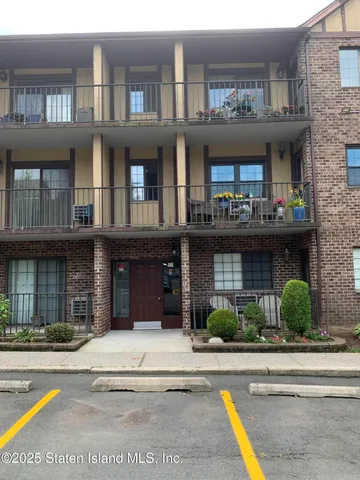 a view of a building with a street