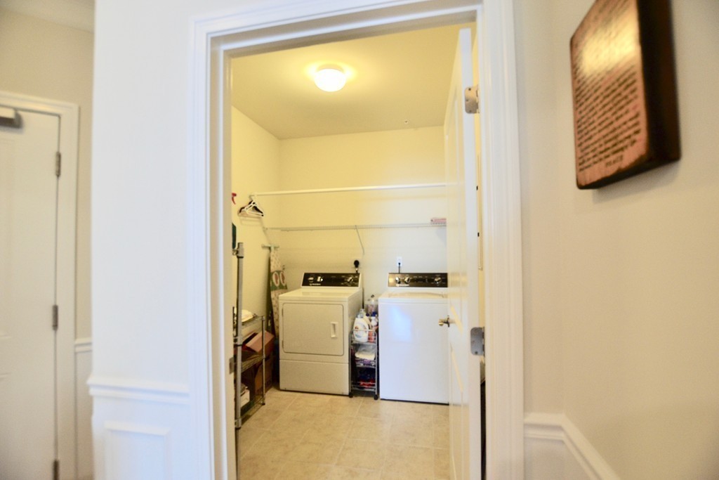 7 Augustus Court, Unit 1013 Reading, MA 01867 - Photo 27 of 34 a view of a bathroom with utility room