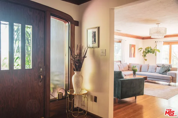 a view of living room with furniture and window