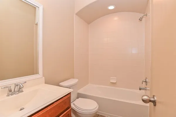 a bathroom with a sink toilet and bathtub