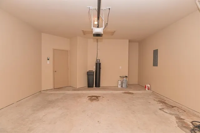 a view of a kitchen with a sink and cabinets