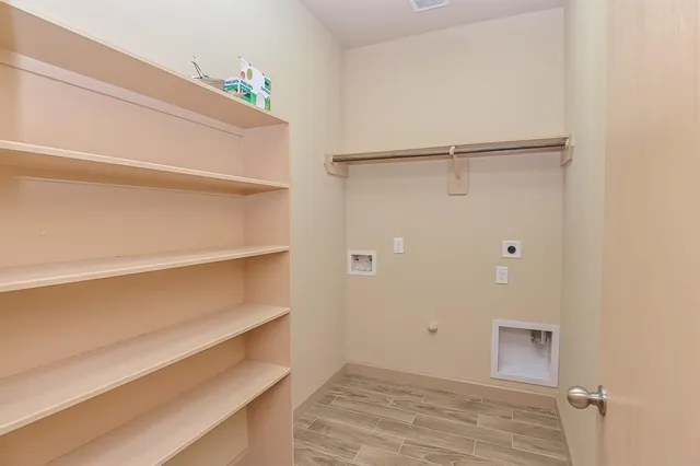 a view of an empty walk in closet