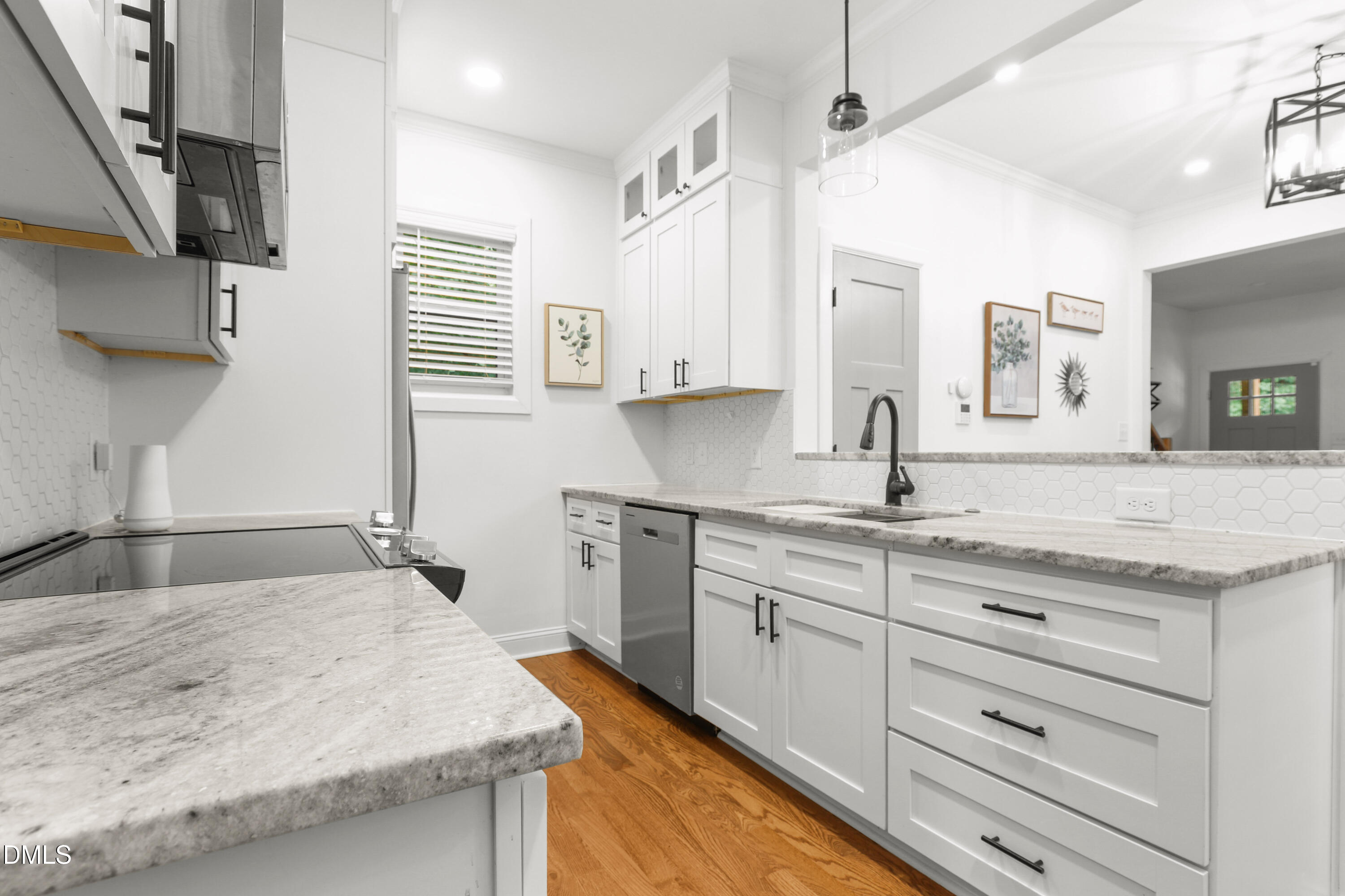 1217 Rosedale Avenue, Unit B Durham, NC 27707 - Photo 9 of 24 a bathroom with a granite countertop sink and a mirror