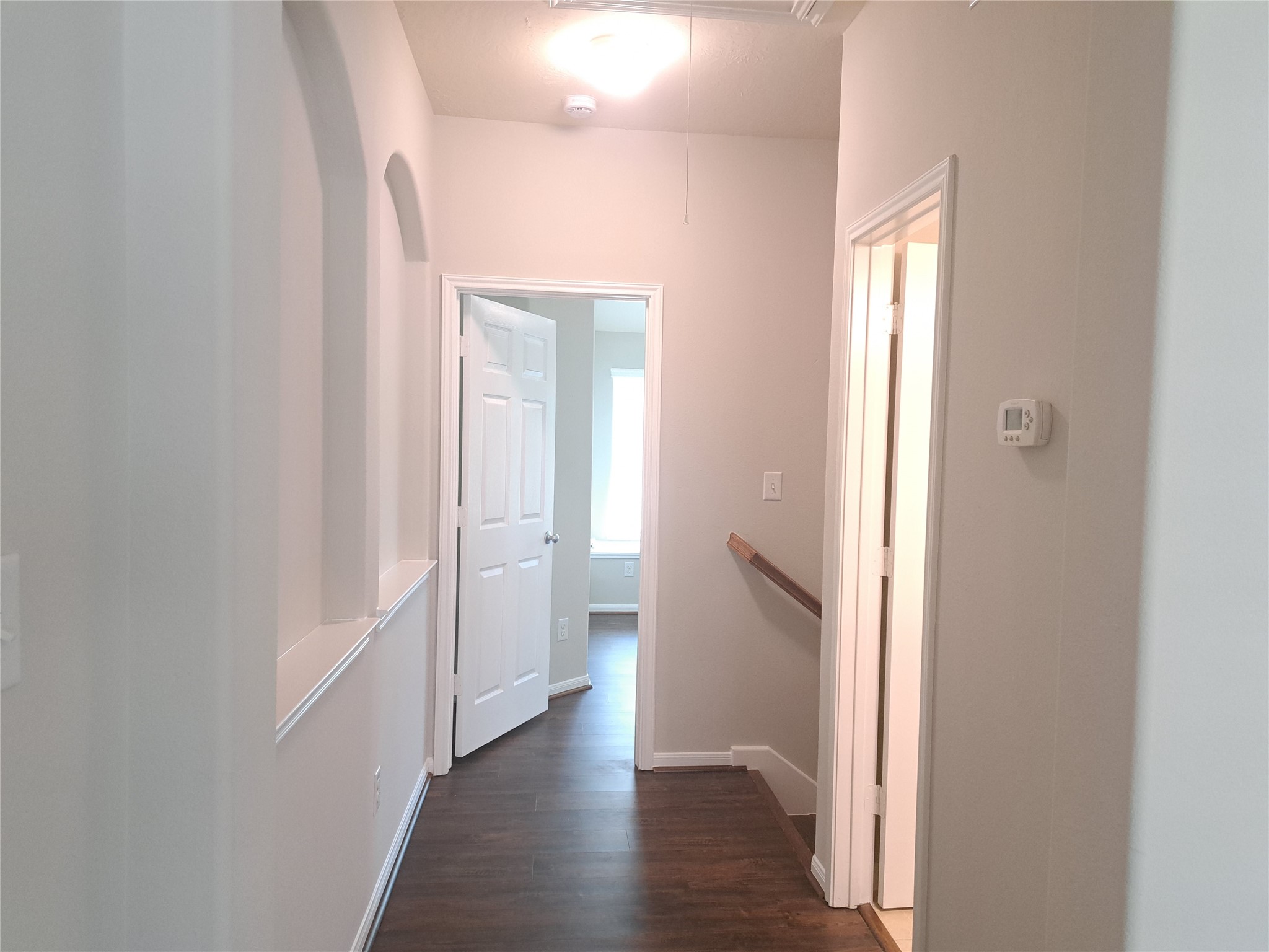 26315 Fox Ridge Lane Katy, TX 77494 - Photo 28 of 39 a view of a hallway with wooden floor