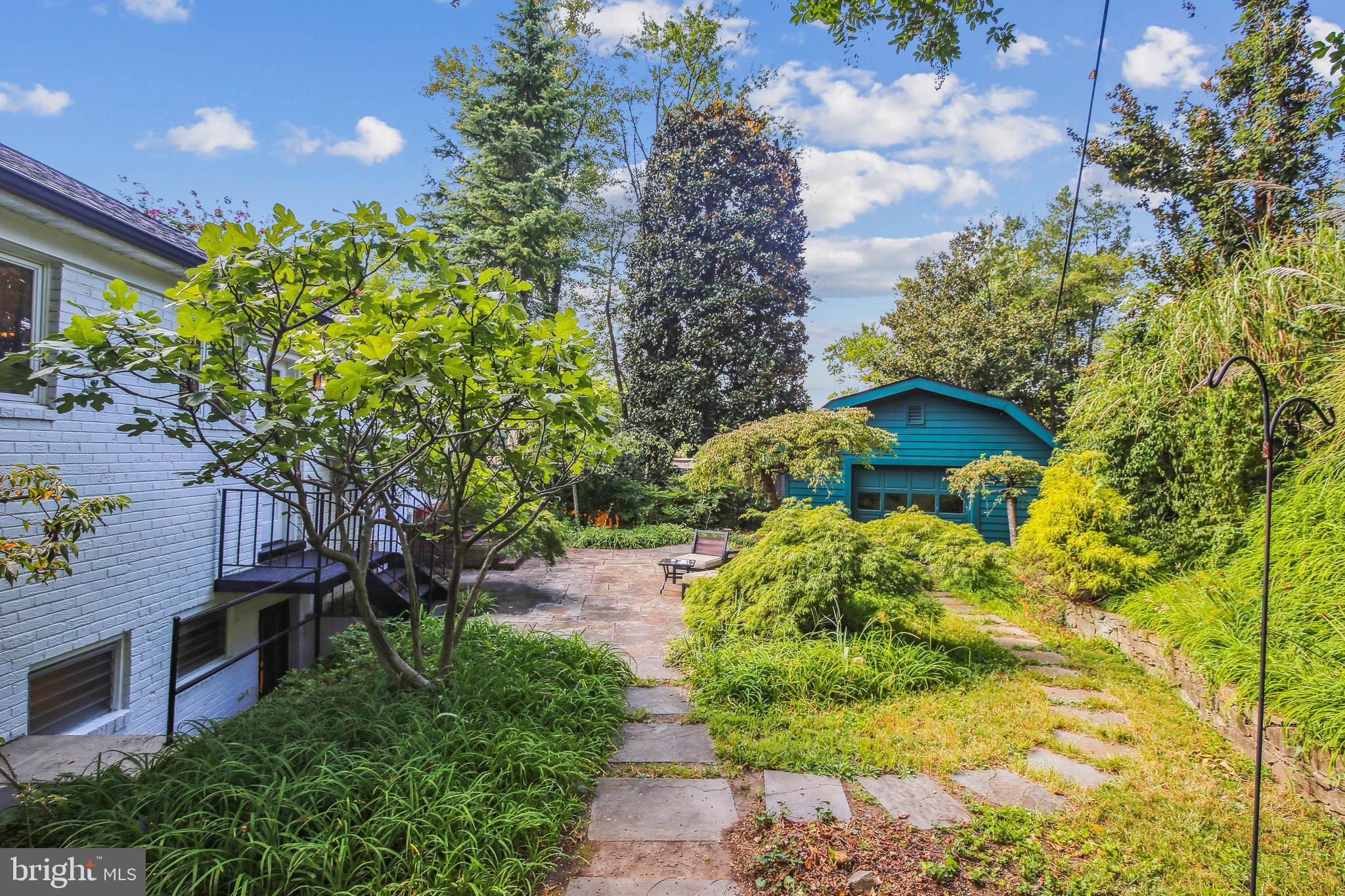 4531 Q Place Northwest Washington, DC 20007 - Photo 44 of 58 Mature landscaping accents rear yard