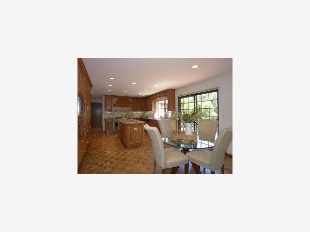 15940 Viewfield Road Monte Sereno, CA 95030 - Photo 2 of 9 a living room with furniture and a large window