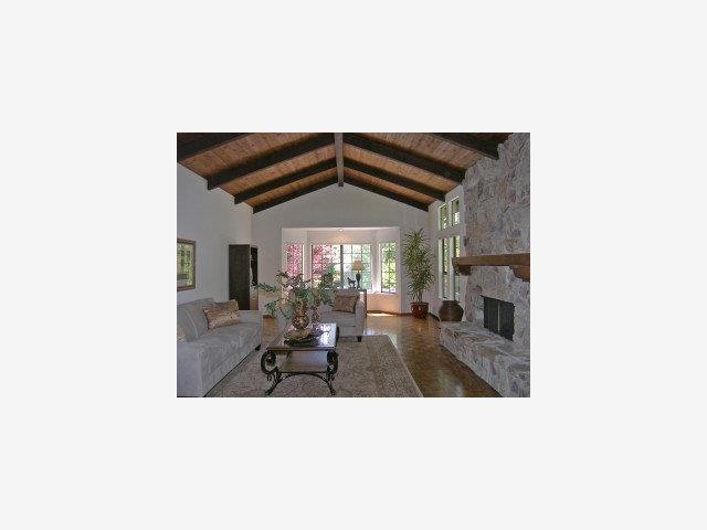 15940 Viewfield Road Monte Sereno, CA 95030 - Photo 3 of 9 a living room with furniture and a fireplace