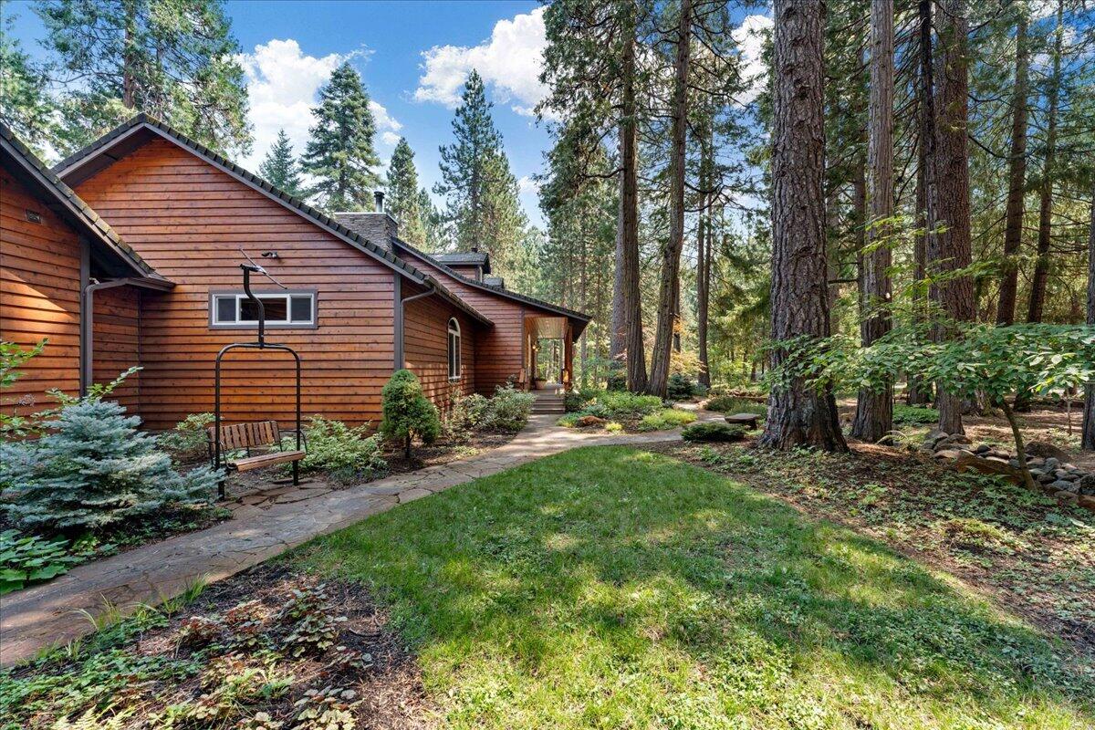 1601 Timber Hills Road Mount Shasta, CA 96067 - Photo 64 of 74 a view of a house with backyard and garden