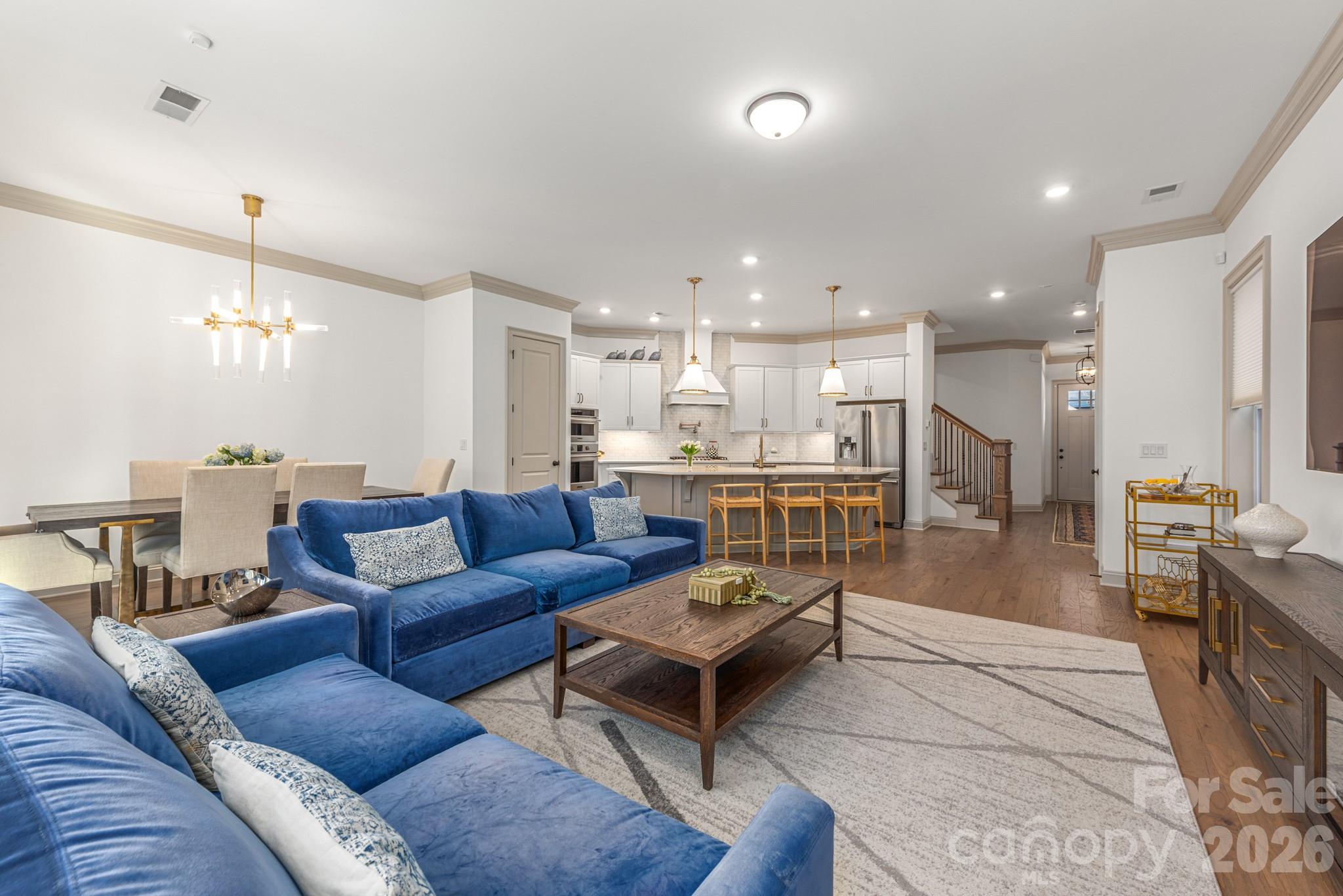 2547 Barry Street Charlotte, NC 28205 - Photo 11 of 45 a living room with furniture and kitchen view