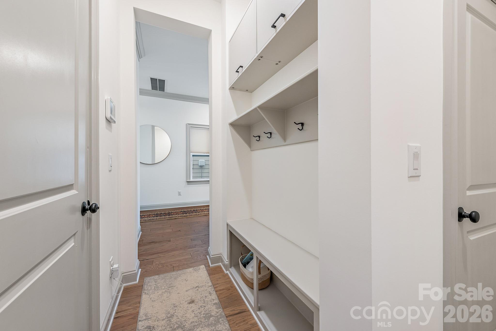 2547 Barry Street Charlotte, NC 28205 - Photo 26 of 45 a bathroom with a double vanity sink a toilet and shower