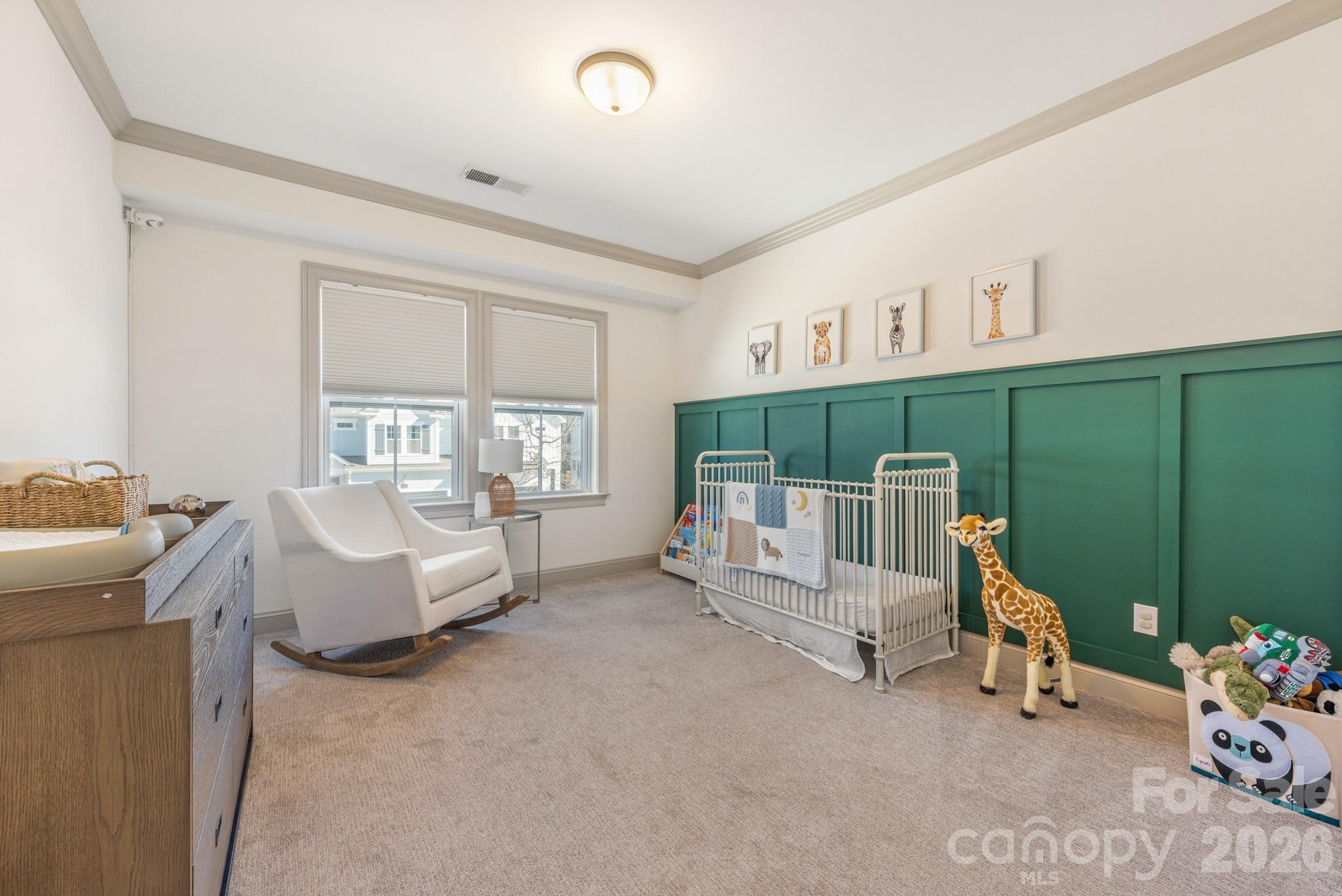 2547 Barry Street Charlotte, NC 28205 - Photo 33 of 45 a bed room with furniture and a gate