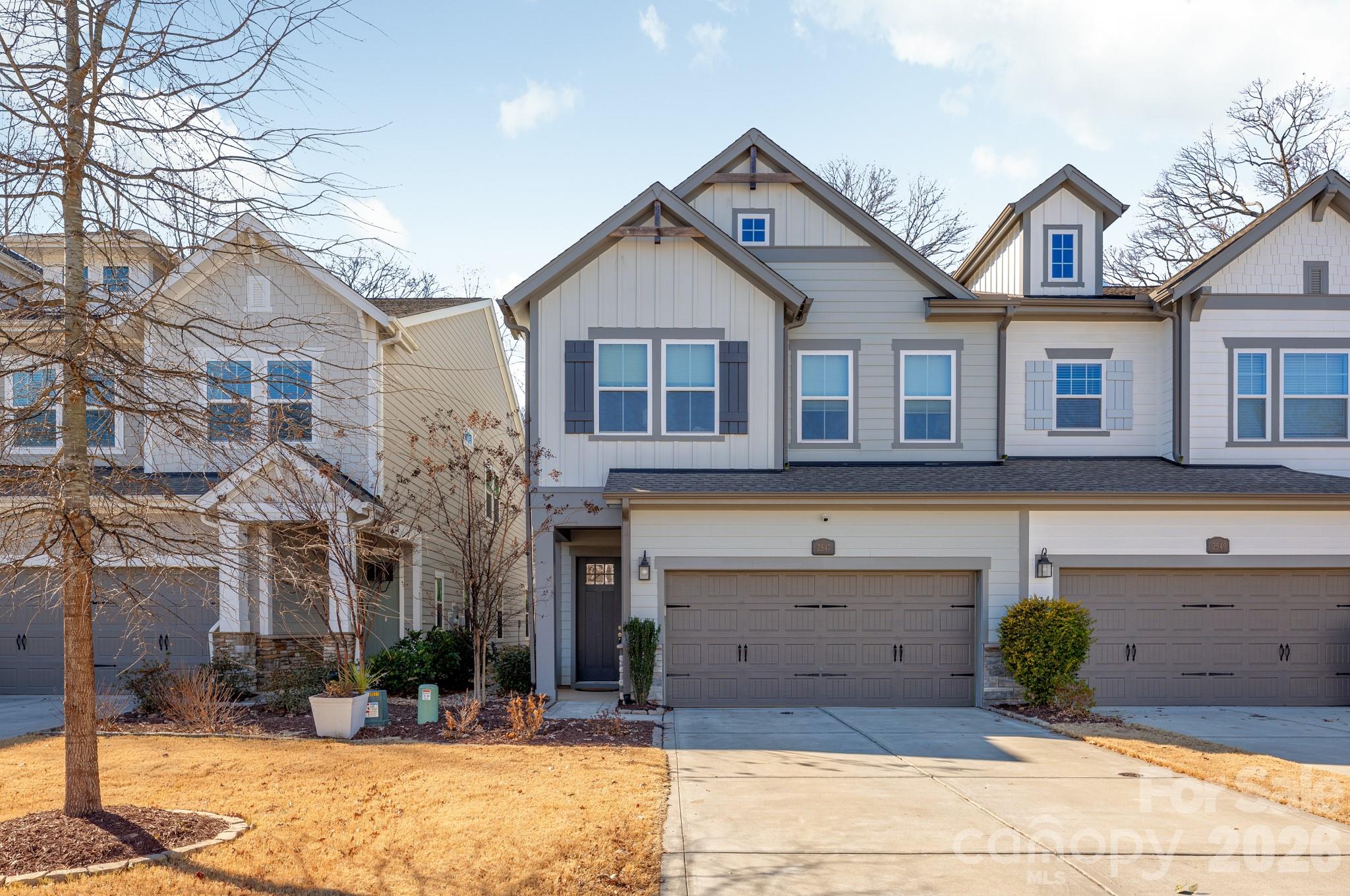 2547 Barry Street Charlotte, NC 28205 - Photo 45 of 45 a front view of a house with a yard