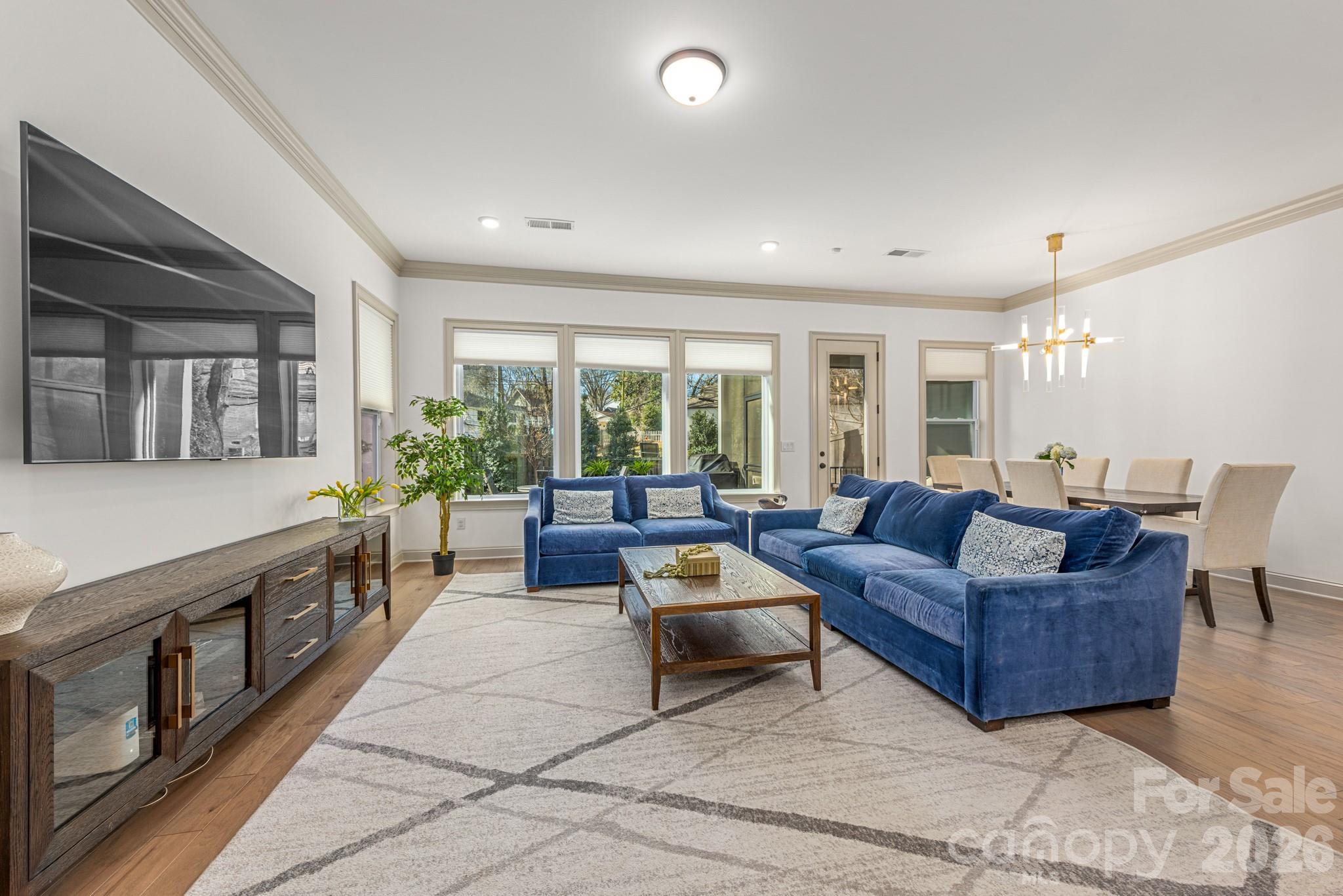2547 Barry Street Charlotte, NC 28205 - Photo 6 of 45 a living room with furniture and a large window