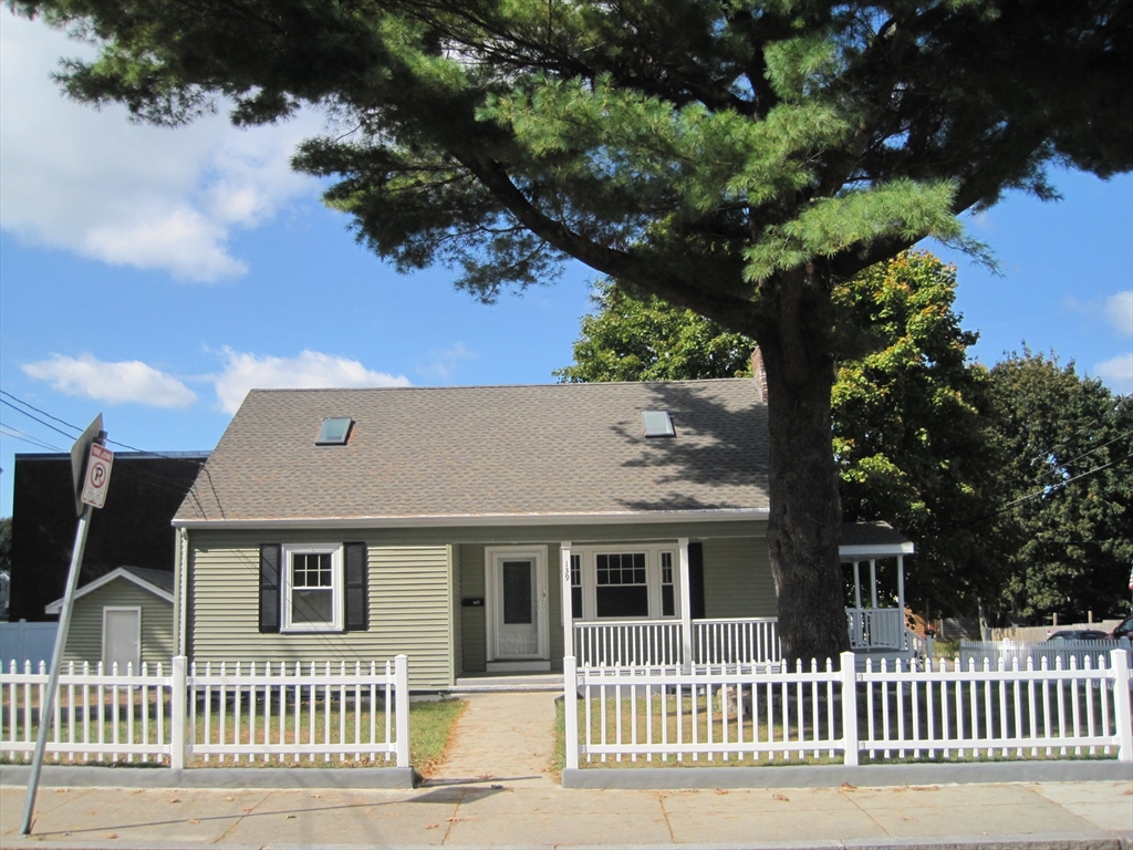 139 Readville Street Boston, MA 02136 - Photo 2 of 31 a front view of a house with a tree