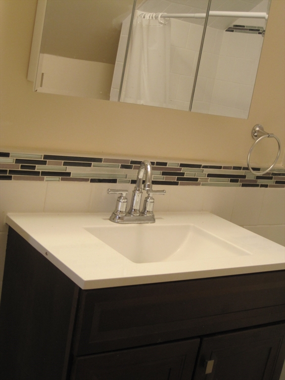 139 Readville Street Boston, MA 02136 - Photo 21 of 31 a close view of sink and cabinets