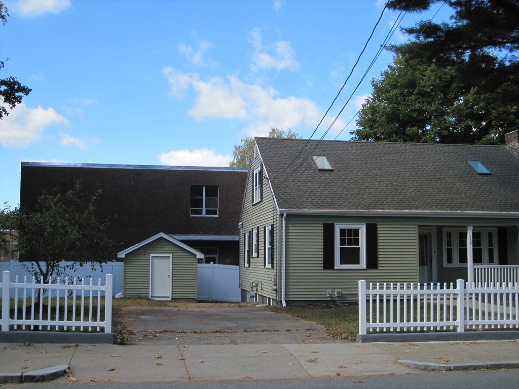 139 Readville Street Boston, MA 02136 - Photo 4 of 31 front view of a house with a porch