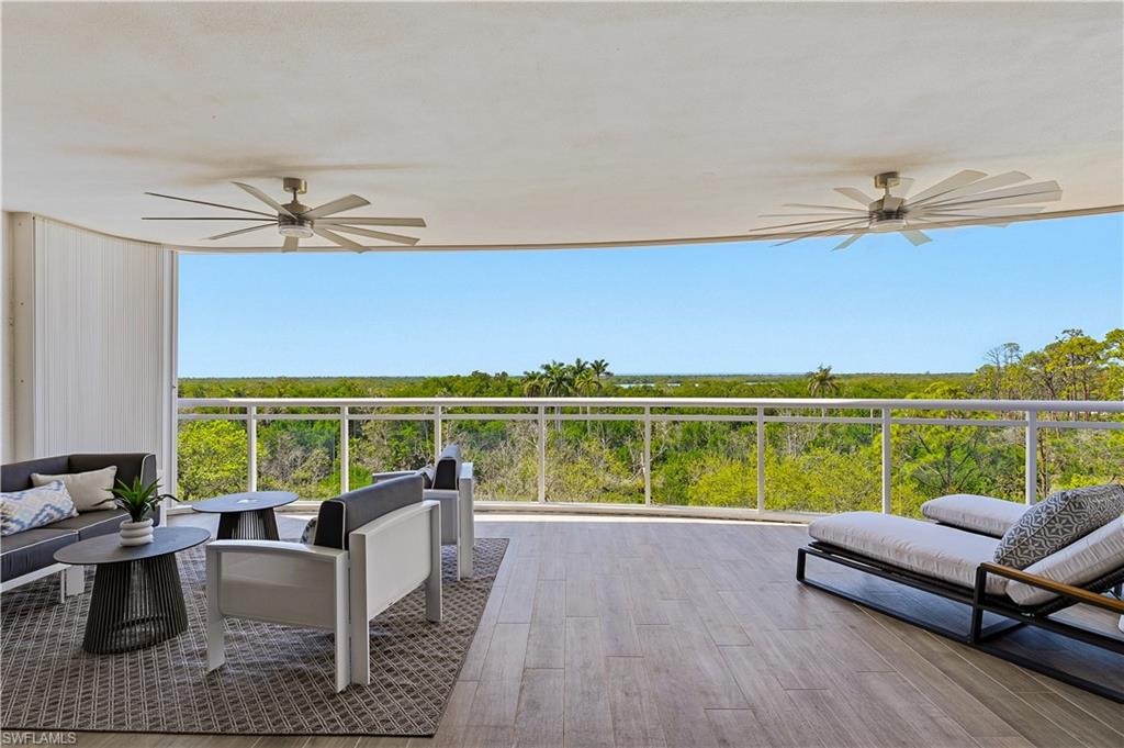 13935 Old Coast Road, Unit 406 Naples, FL 34110 - Photo 28 of 49 View of patio / terrace featuring ceiling fan and outdoor furniture