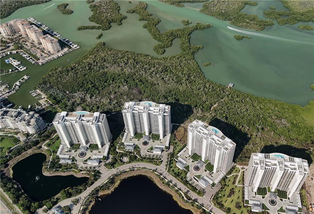 13935 Old Coast Road, Unit 406 Naples, FL 34110 - Photo 31 of 49 Aerial view of property's location featuring a nearby body of water and nearby urban area