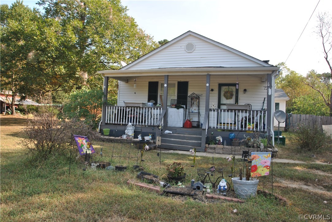 8167 Varina Road Henrico, VA 23231 - Photo 1 of 9 a front view of a house with garden