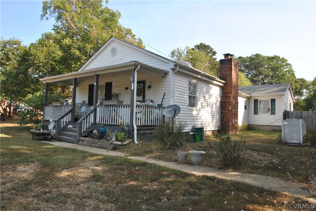 8167 Varina Road Henrico, VA 23231 - Photo 3 of 9 a view of a house with a yard