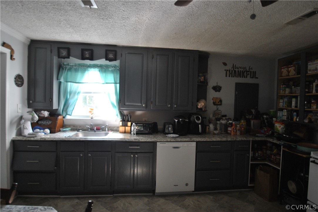 8167 Varina Road Henrico, VA 23231 - Photo 5 of 9 a kitchen with a sink and cabinets