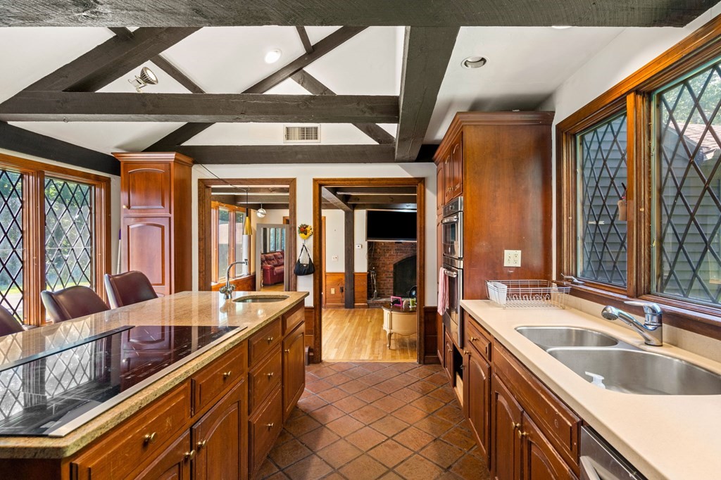 10 Beaver Pond Road Beverly, MA 01915 - Photo 23 of 39 a large kitchen with kitchen island a large window