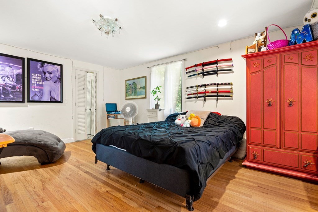 10 Beaver Pond Road Beverly, MA 01915 - Photo 30 of 39 a bedroom with a bed and window