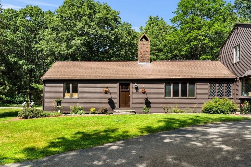 10 Beaver Pond Road Beverly, MA 01915 - Photo 3 of 39 a front view of house with yard and green space