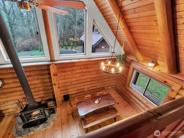 a spacious bedroom with a bed and a table