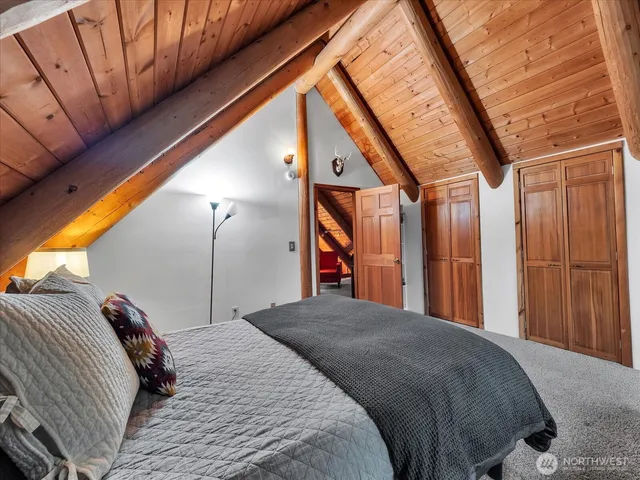 a living room with furniture and a ceiling fan