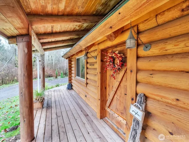a view of balcony with wooden floor and stairs