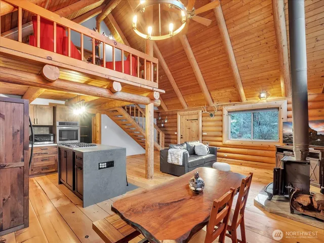 a view of a patio with table and chairs