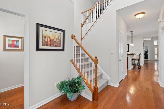 a view of entryway with wooden floor
