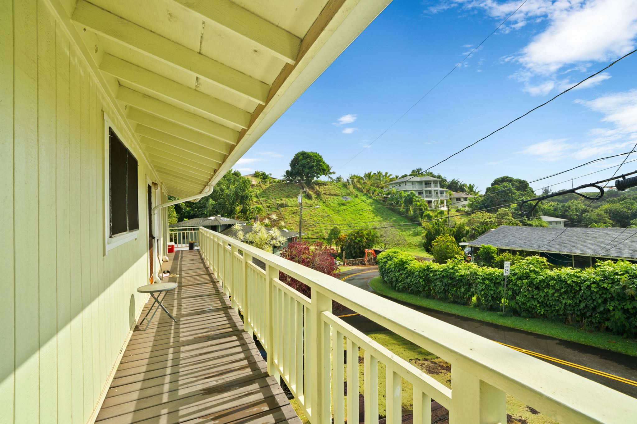 4906 Aliali Road Kapaa, HI 96746 - Photo 11 of 30 a view of a balcony with wooden floor