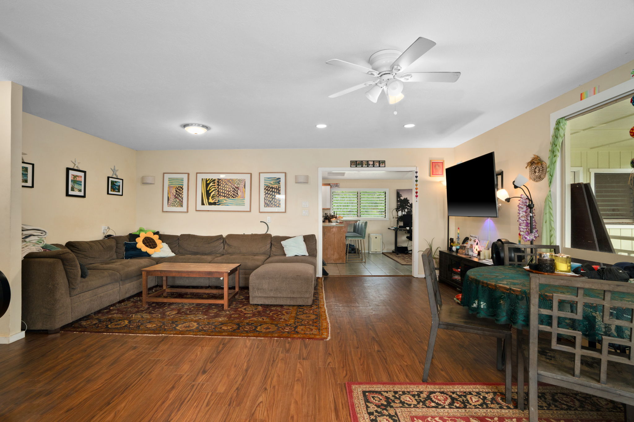 4906 Aliali Road Kapaa, HI 96746 - Photo 15 of 30 a living room with furniture and a flat screen tv