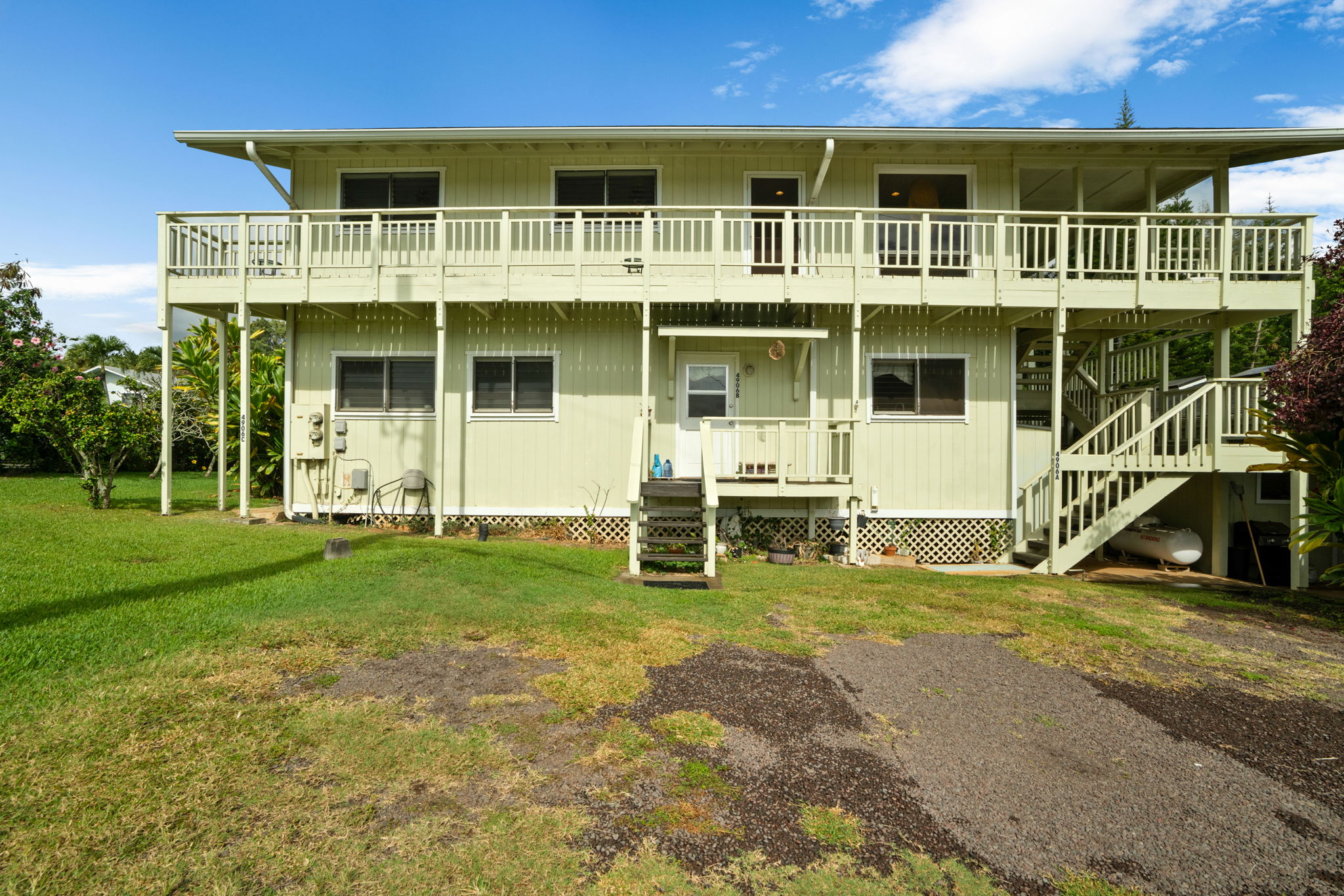 4906 Aliali Road Kapaa, HI 96746 - Photo 17 of 30 a front view of a house with a yard