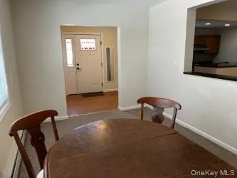 a bedroom with a bed and a chair